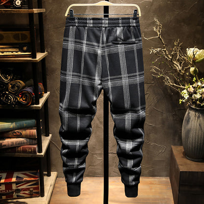 Autumn and winter striped casual pants men's Korean version of the trend black gray Mao Ni color tide card foot trousers male