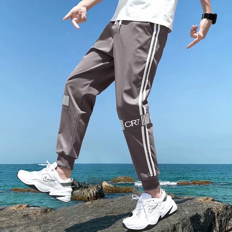 2021 casual pants men's Korean version of loose casual trend rod strips fashion small feet young people nine pants