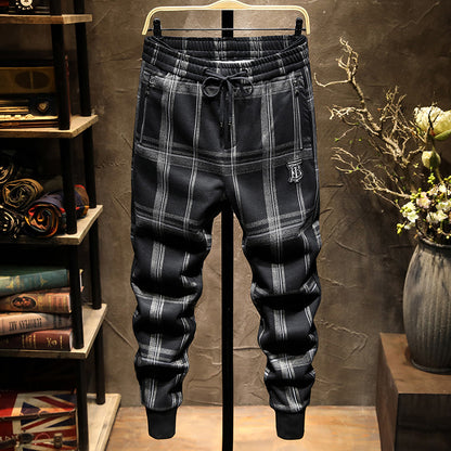 Autumn and winter striped casual pants men's Korean version of the trend black gray Mao Ni color tide card foot trousers male